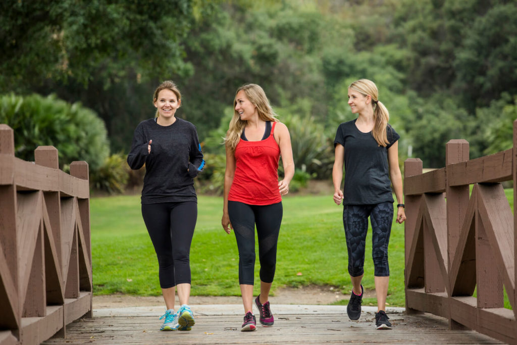 women-walking-together-in-the-outdoors